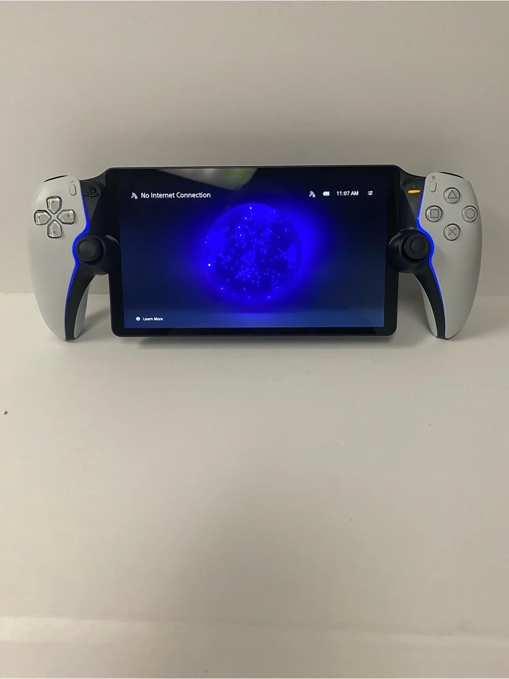 Sony PlayStation Portable-style Handheld with White Side Controllers